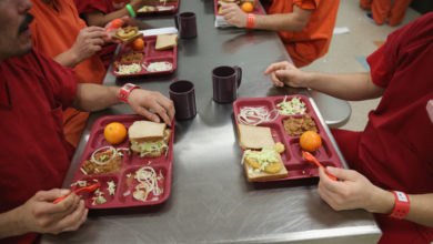 Immigrant Detainees eat lunch