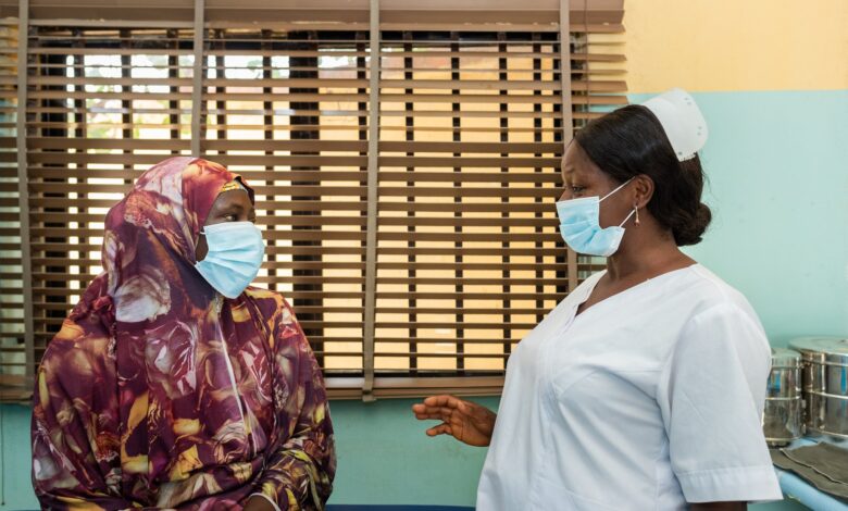 Etinosa Yvonne A nurse counsels a patient before she gets screened for cervical cancer, Niger State