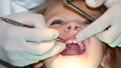 Young Girl Gets Dental Exam Cavitie