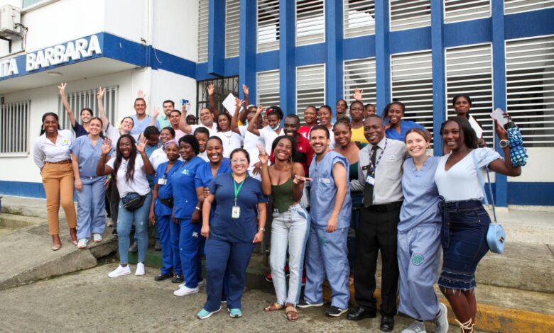 Members of the Hospital Padrino strategy and newly trained staff of the Timbiquí Hospital outside the health center, in Timbiquí, Cauca, Colombia