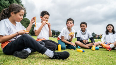 Children's team taking a break after training on the sports field