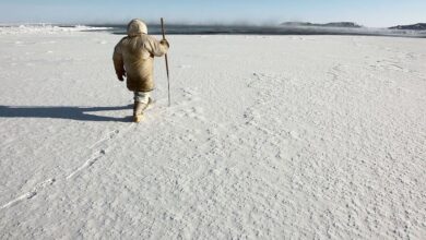 Inuit hunter checking the ice