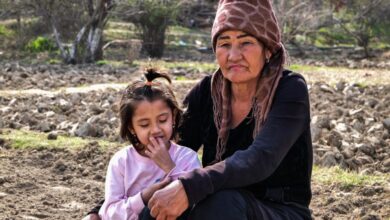 Uzbek grandma with grandchild
