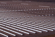 Aerial Shot of Rows of Mirrors at Parabolic Trough Solar Plant