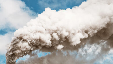 Thick smoke coming from an industrial chimney