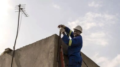 ProEnergia worker installing last-mile connection