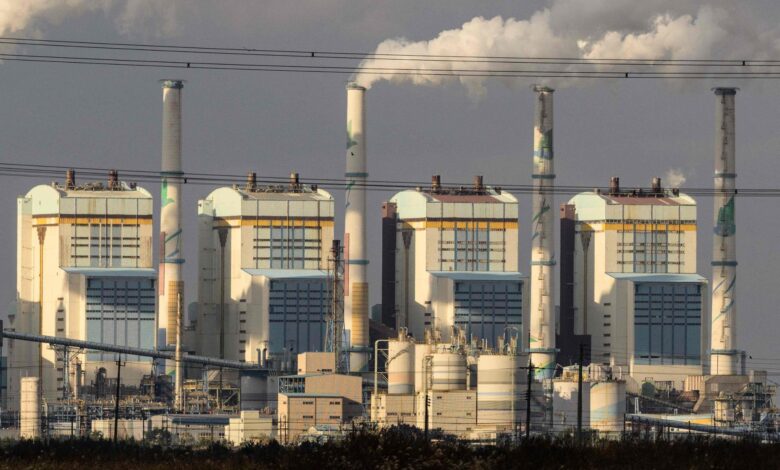 Exhaust gases billowing from the chimneys of the Taean Thermal Power Station