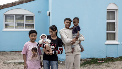 Zaitoon Ragman with her baby Naa-iqah (6 days old) and older children Raeez, Naa-ilah and Raheez at their home in Mitchell's Plain South Africa. Zaitoon survived PPH after child birth. Postpartum hemorrage (PPH) is severe bleeding after childbirth. Left without essential care, when a mother dies, her children face significantly higher risk of death themselves. WHO partners to stop Postpartum hemorrage (PPH) and save the lives of women and mothers. photo: KSchermbrucker/WHO 16 September 2025