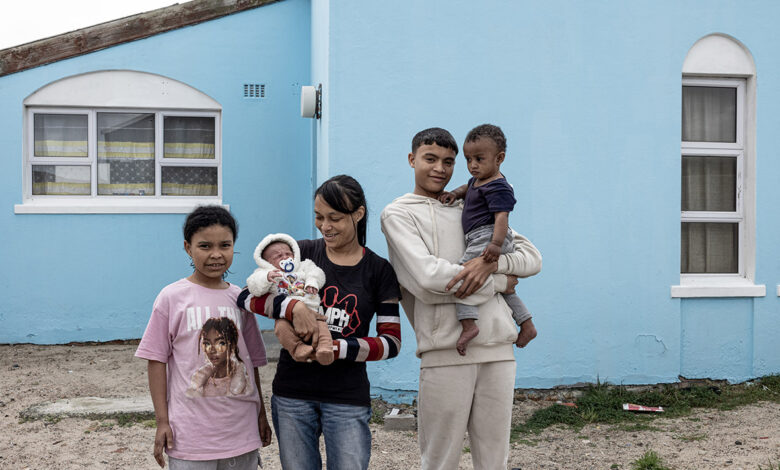 Zaitoon Ragman with her baby Naa-iqah (6 days old) and older children Raeez, Naa-ilah and Raheez at their home in Mitchell's Plain South Africa. Zaitoon survived PPH after child birth. Postpartum hemorrage (PPH) is severe bleeding after childbirth. Left without essential care, when a mother dies, her children face significantly higher risk of death themselves. WHO partners to stop Postpartum hemorrage (PPH) and save the lives of women and mothers. photo: KSchermbrucker/WHO 16 September 2025