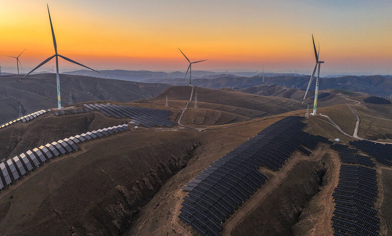 Sunset Glow Lights Up Wind Farm In Qingyang