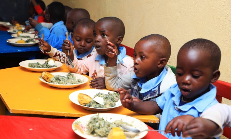 Children eat nutritious food at ECDC in Nyamasheke District through “GIKURIRO KURI BOSE” program, Rwanda