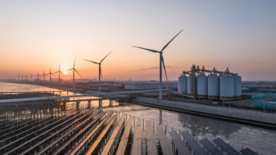 solar power and wind power beside sea