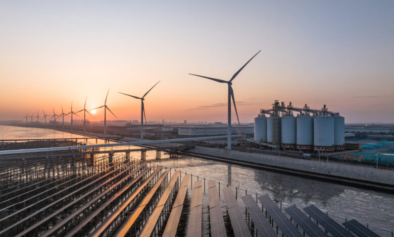 solar power and wind power beside sea