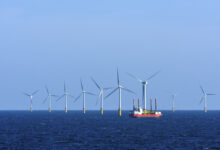 Offshore wind farm with supply ship, IJmuiden, North Sea, Netherlands
