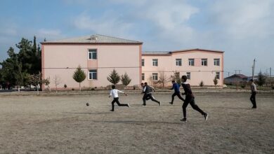 School kids play soccer in Qardili village Azerbeijan
