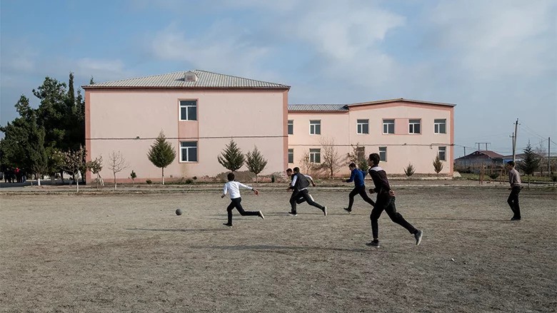 School kids play soccer in Qardili village Azerbeijan
