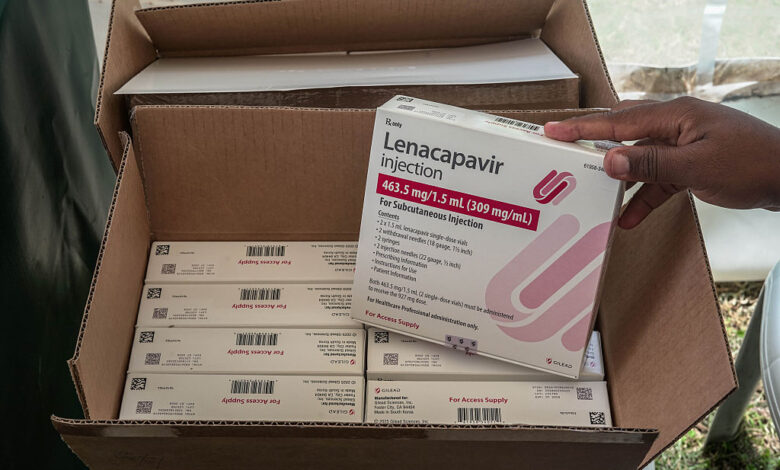 A man holds a packaging containing lenacapavir, a long-