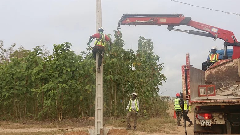 Installation of electricity poles in the municipality of Lokossa, Benin