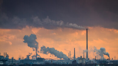 Dramatic sunset over industrial area