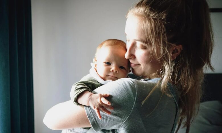 Mother with 2 months old baby boy