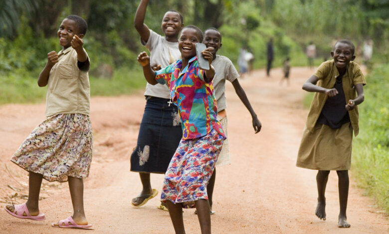 Group of local people, laughing, Masango, Cibitoke, Burundi, Africa