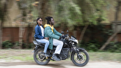Couple riding 350cc electric motorcycle in Nairobi
