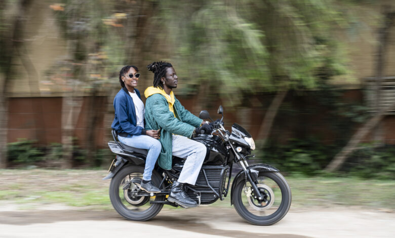 Couple riding 350cc electric motorcycle in Nairobi