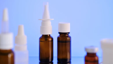 Nasal spray bottle and pills