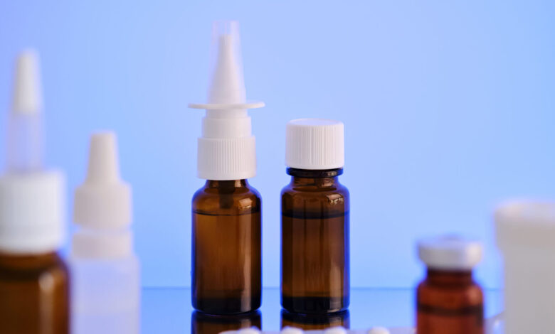 Nasal spray bottle and pills