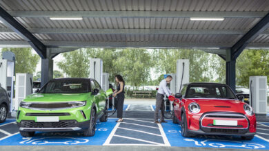 UK, York, People charging their electric cars at charging station