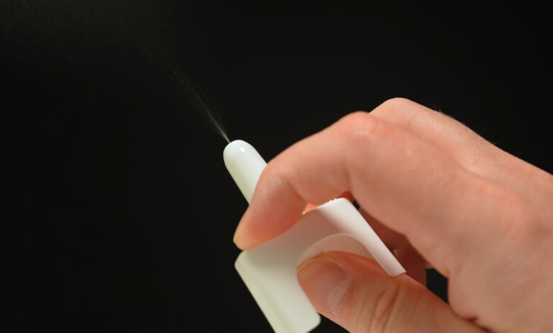 Naloxone nasal spray from emergency overdose kit bag used for recovery from narcotic opioid medications or street drugs overdose.