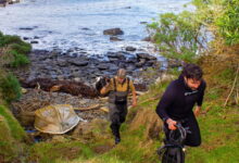 Members of the Kāi Tahu marine ranger team return from harvesting seaweed