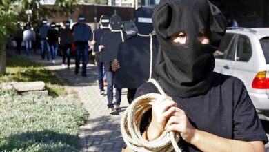 Protesters hold cardboard figures with ropes round their necks during a rally against the death penalty in Beirut, Lebanon in October 2013.