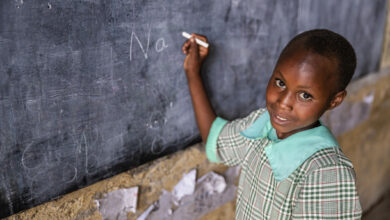 Schoolgirl in a school near Masai Mara Game Reserve in Kenya