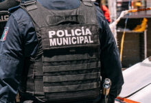"Policia Municipal" on a Mexican Police Officer Uniform near the Border Crossing in Juárez, Mexico
