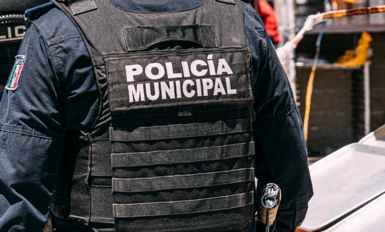 "Policia Municipal" on a Mexican Police Officer Uniform near the Border Crossing in Juárez, Mexico