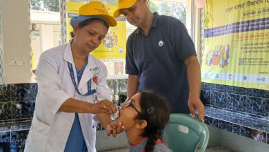 Riana Teresa Gomez taking oral cholera vaccine a vacination site set up at St. John Vianney Hospital in Tejgaon, Dhaka